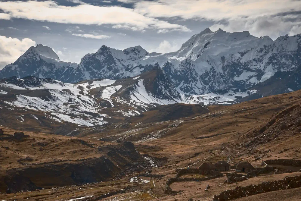 The snow-capped Ausangate massif above the highland valley