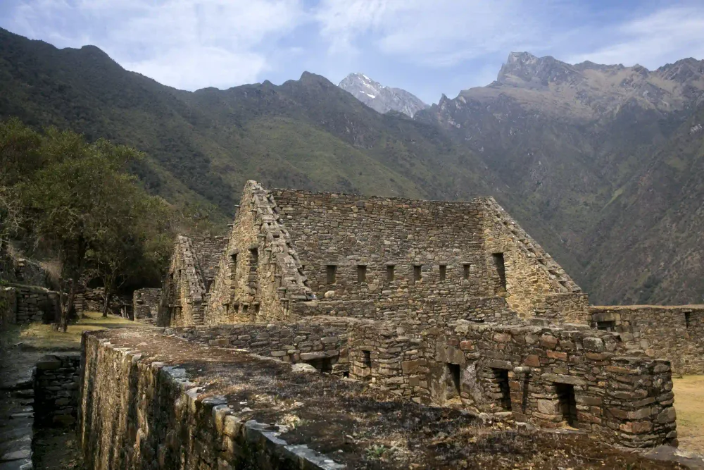Choquequirao Inca stone ruins with the Andes mountains behind on the 3-day trek