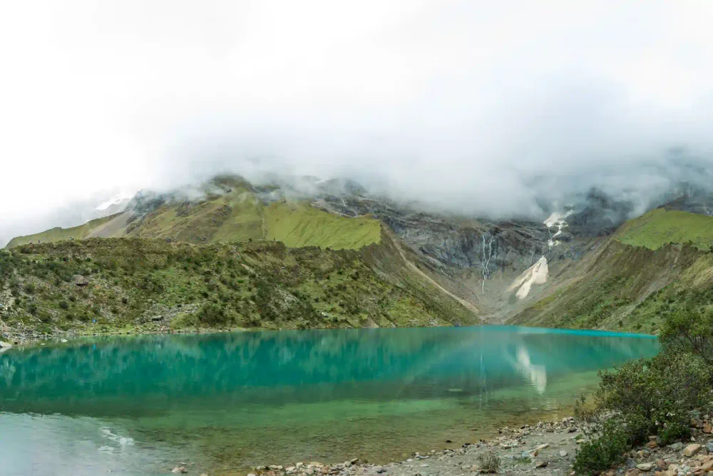 Panoramic view of Humantay Lake and the trail beside it
