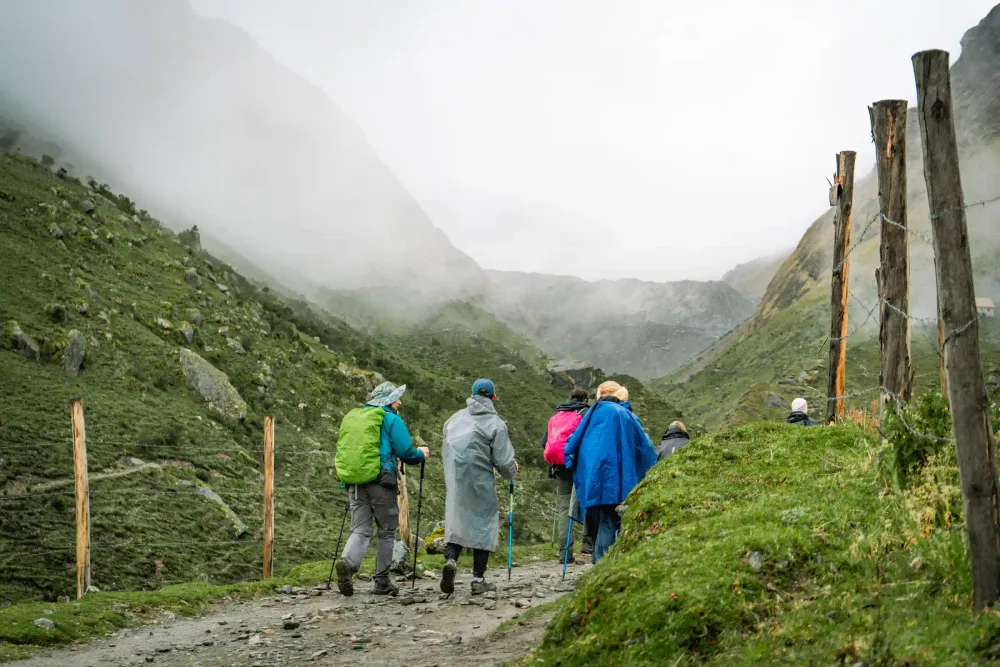 Hiking the misty cloud-forest railway path toward Aguas Calientes