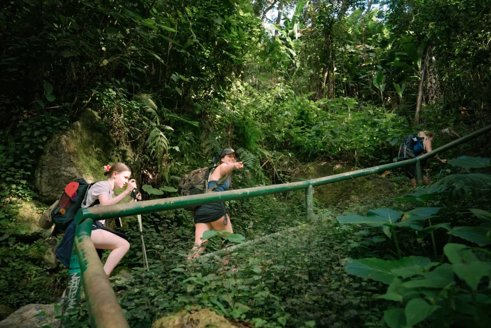 Crossing a river through the jungle on the Inca Jungle adventure