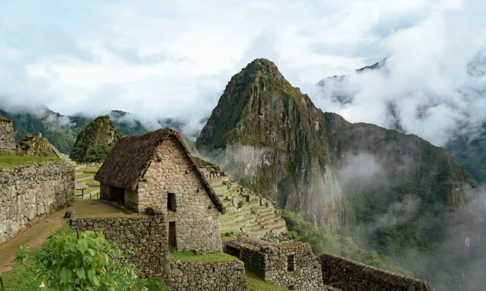 Machu Picchu citadel with Huayna Picchu at first light on the 2-day train tour