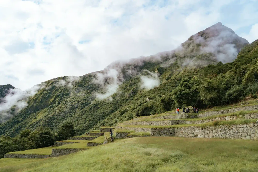 Inca agricultural terraces below the green peaks near Machu Picchu