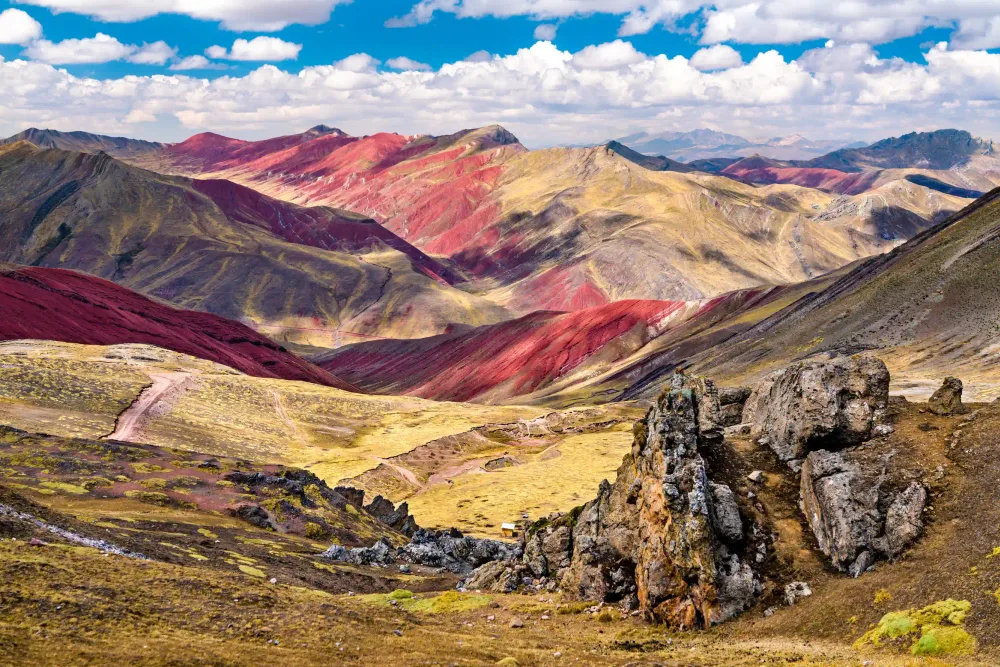 The Stone Forest rock formations beside the Palcoyo rainbow mountains
