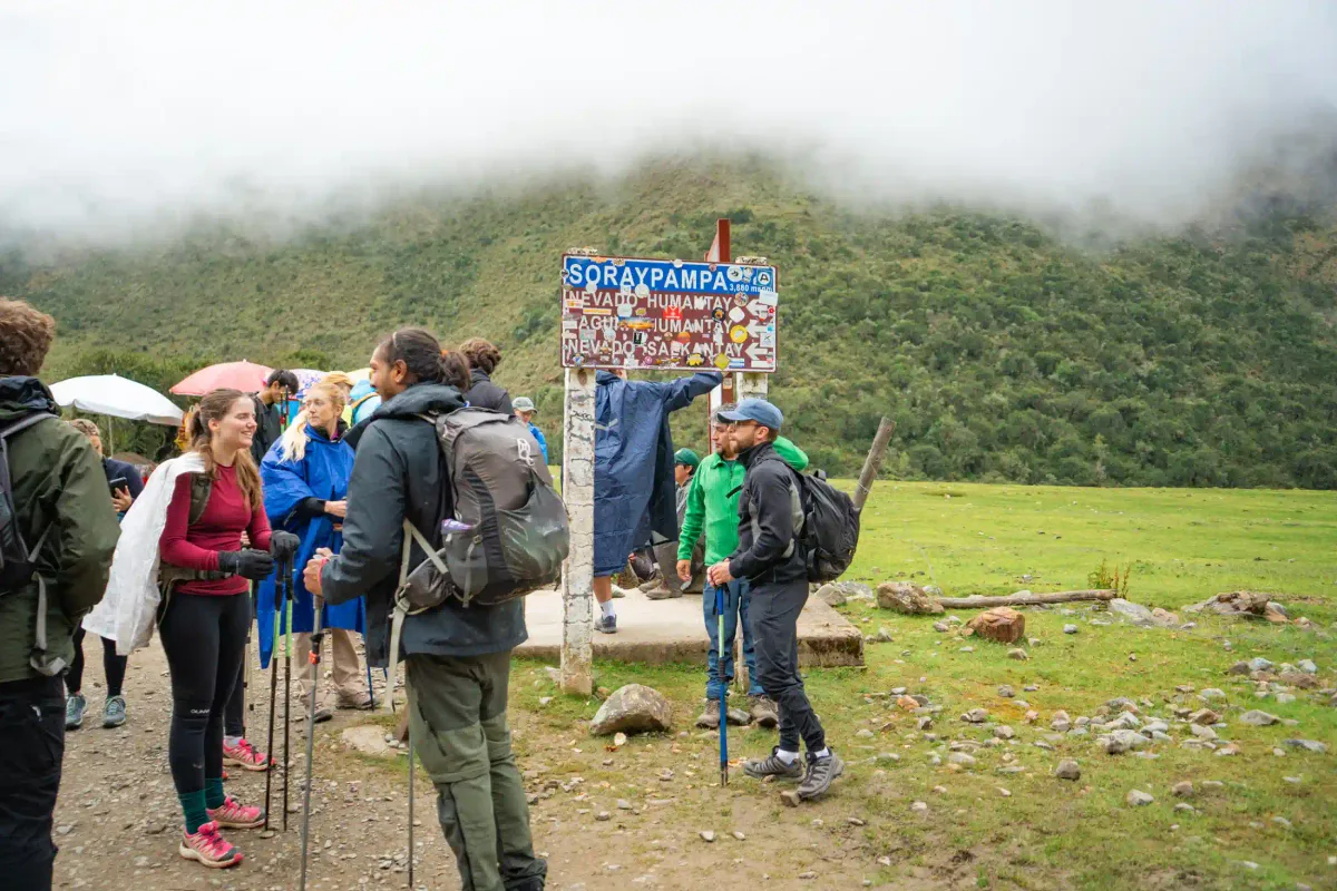 Trekkers hiking toward Humantay Lake and the Salkantay Pass