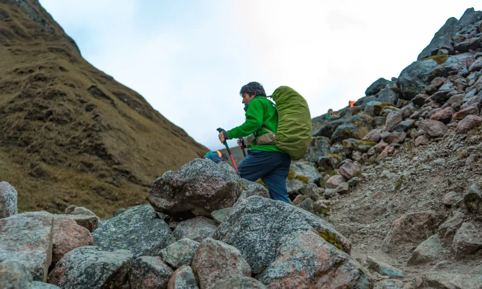 Trekker climbing the Salkantay high pass on the Salkantay Trek and Inca Trail to Machu Picchu