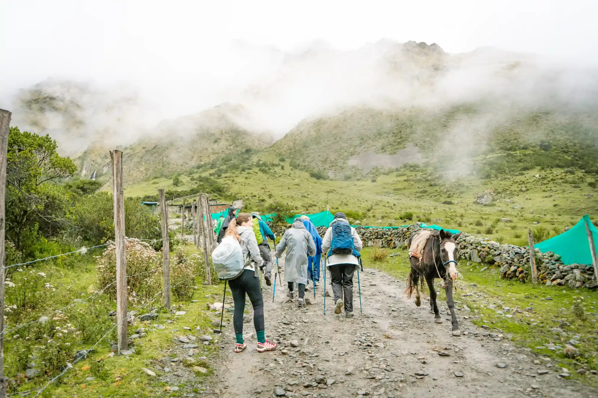Trekkers on the Salkantay Trek 3 Days route to Machu Picchu beneath Nevado Salkantay with Machu Picchu Team
